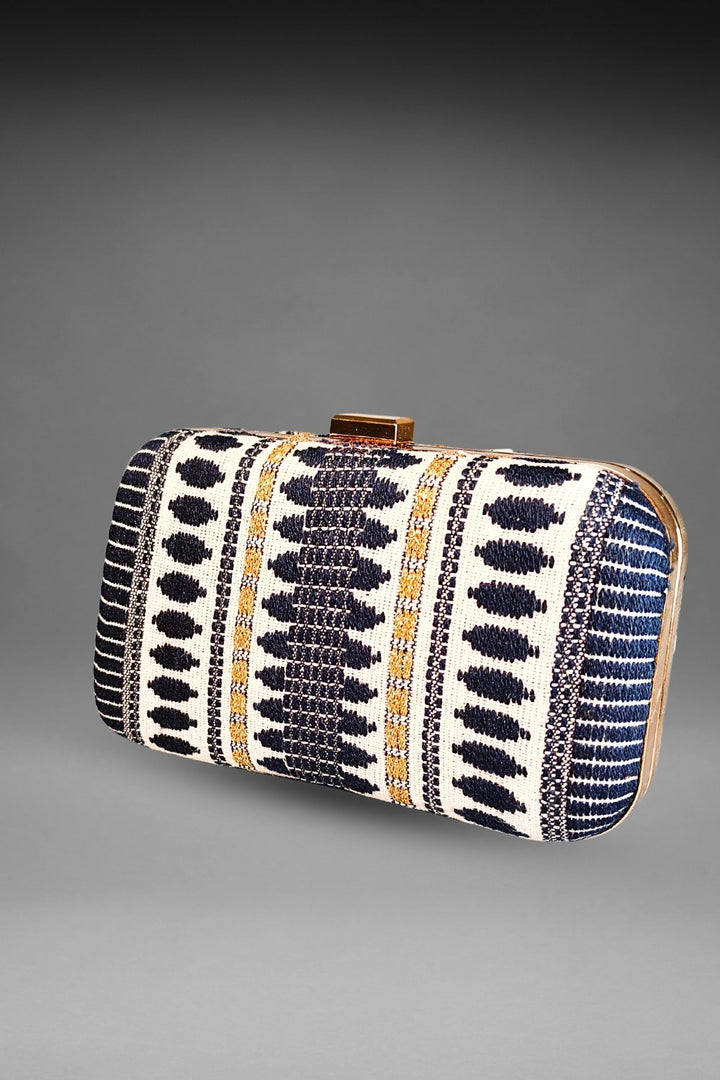 black and white threadwork clutch