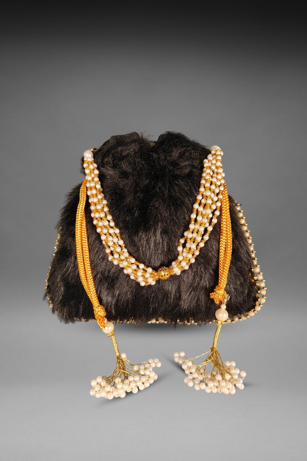 black fur potli bag