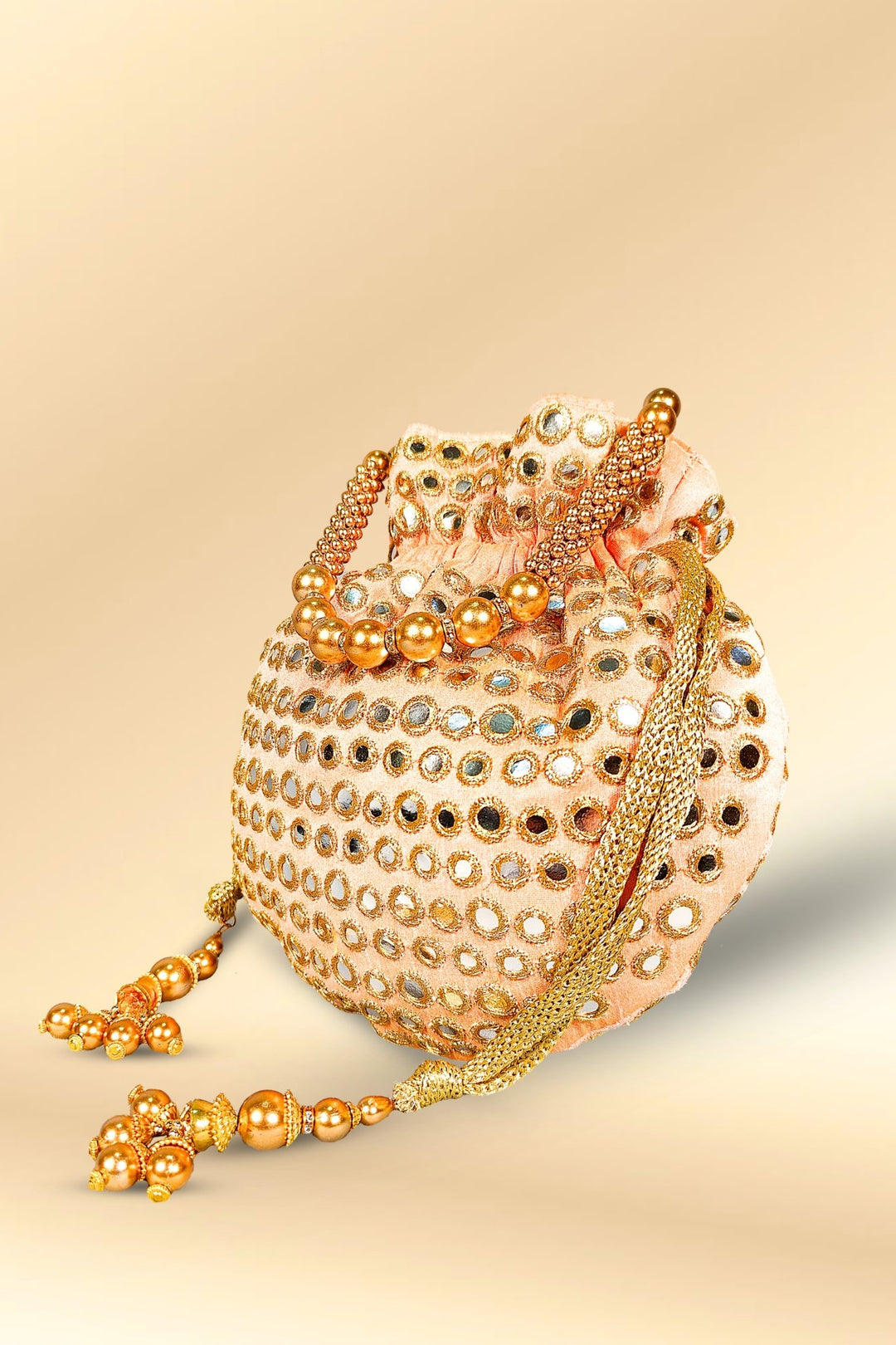 peach mirror work potli bag
