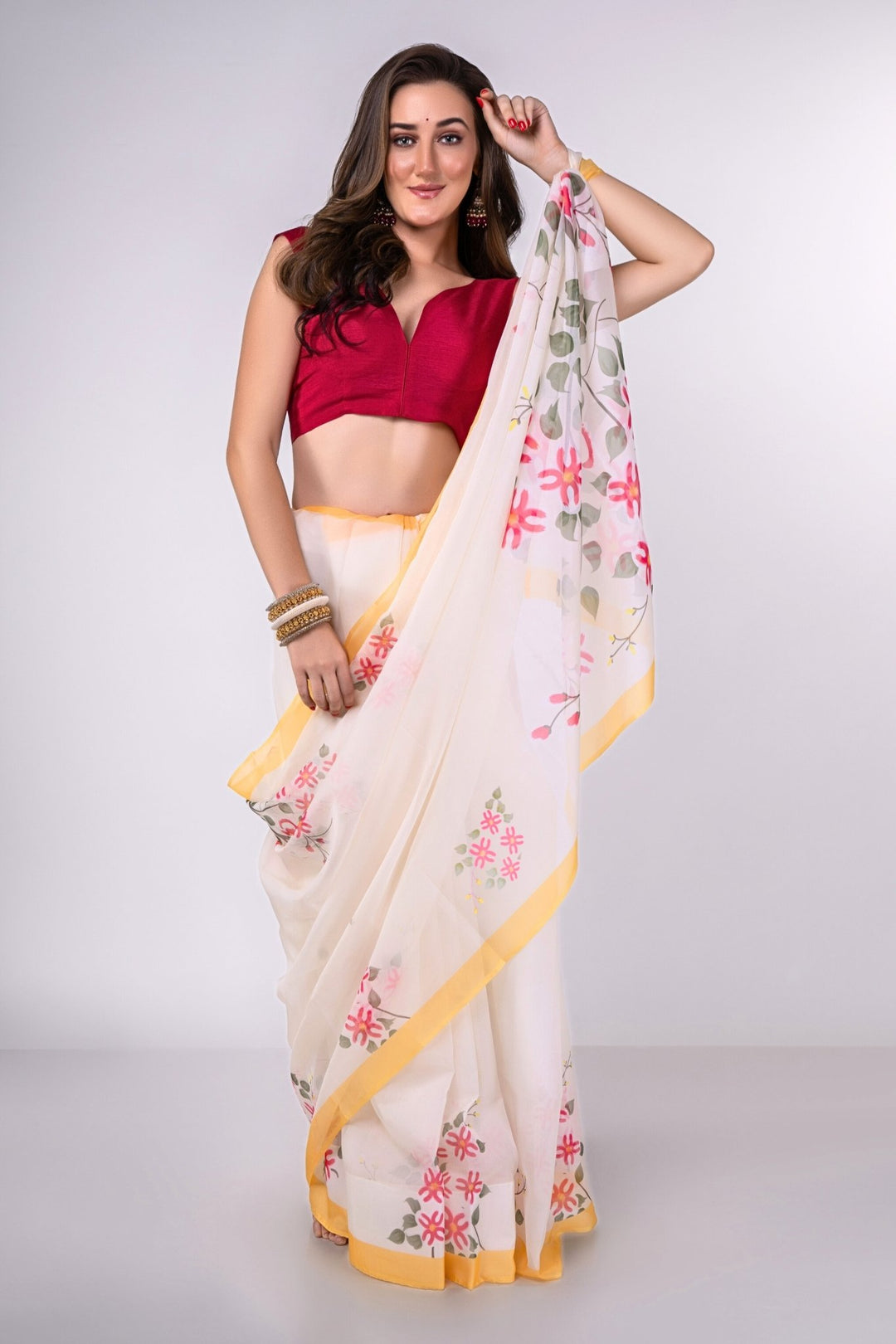 white saree with contrast blouse