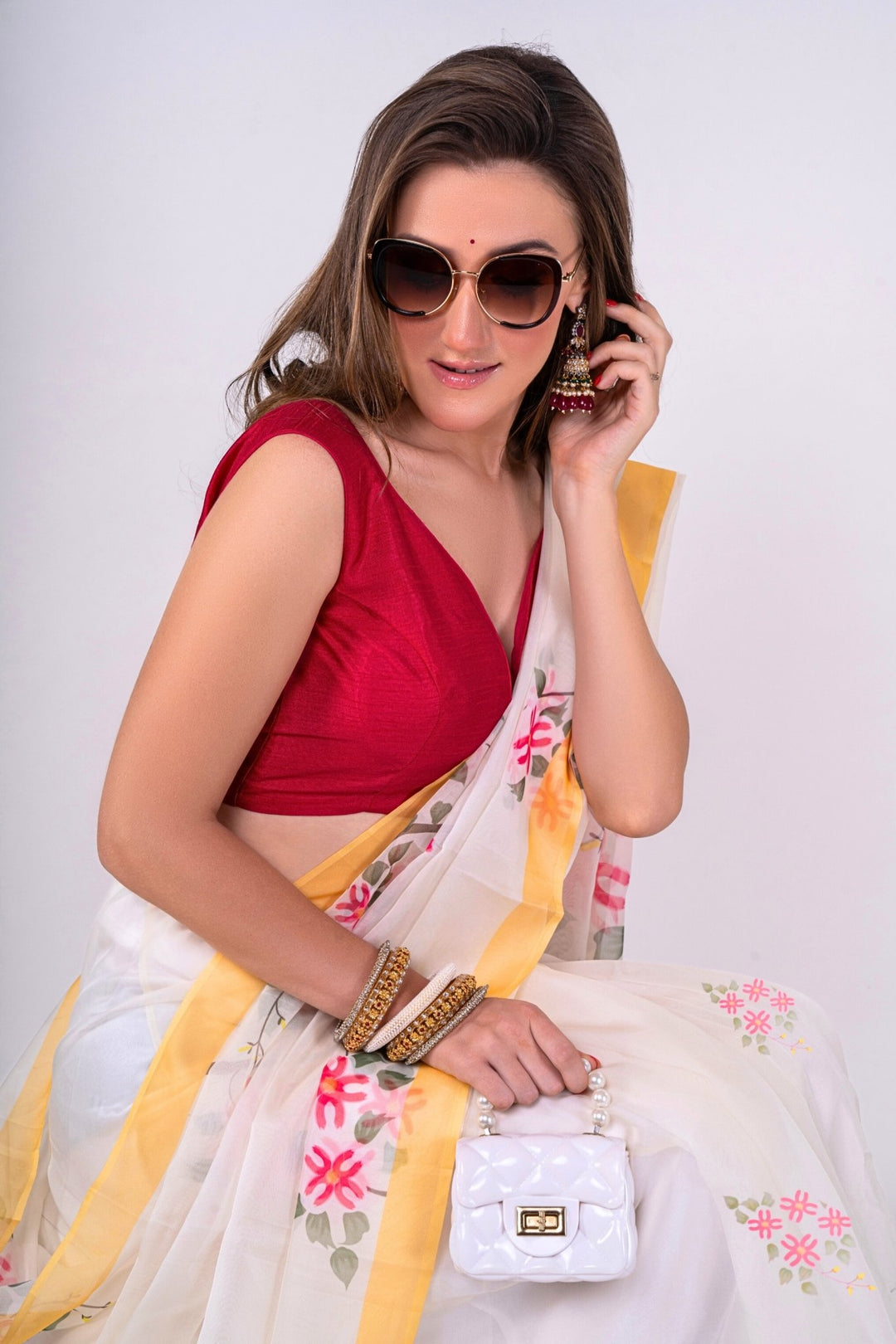 white saree with contrast blouse