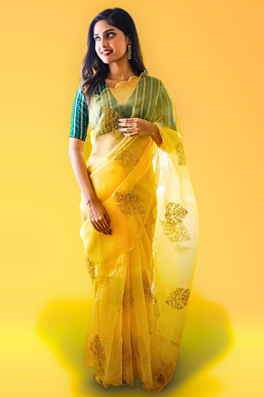 yellow saree with green blouse